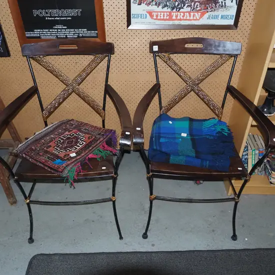 pair of metal wood and cane armchairs