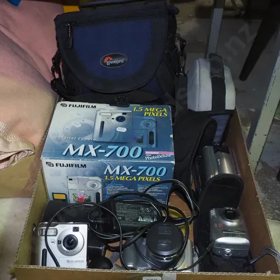 box; digital cameras, video cameras, bags etc
