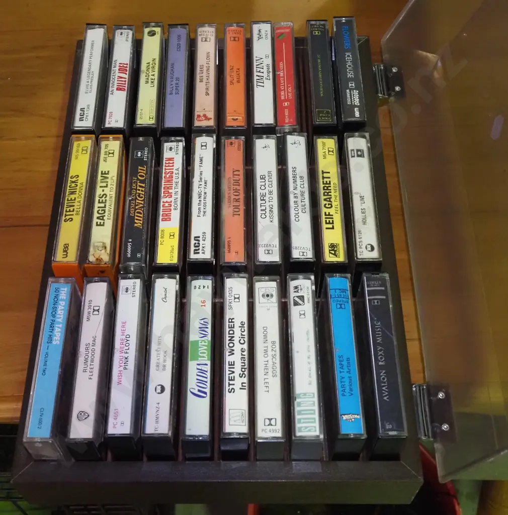 1980s tape cassettes in plastic holder Image 1++
