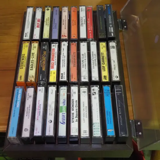 1980s tape cassettes in plastic holder