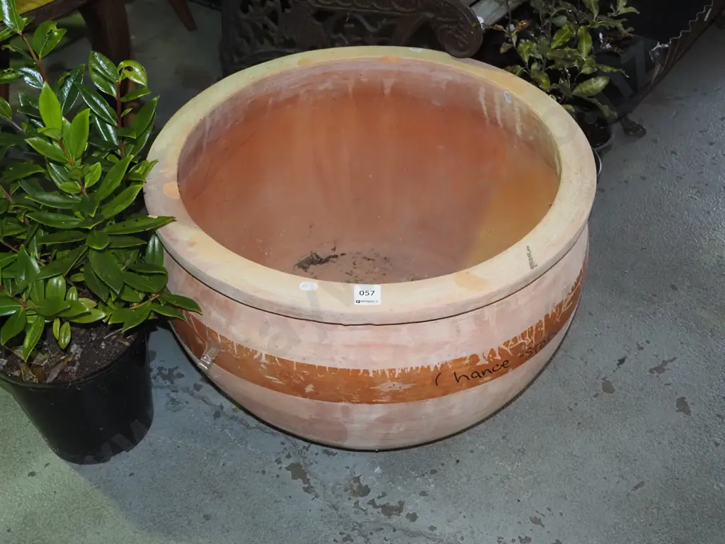 large terracotta garden planter H-320 Diam-500 (band of tape around middle) Image 1++
