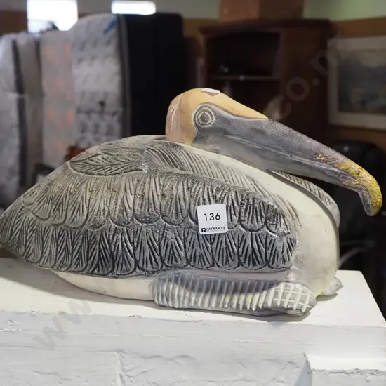 carved wooden pelican - damage to nose