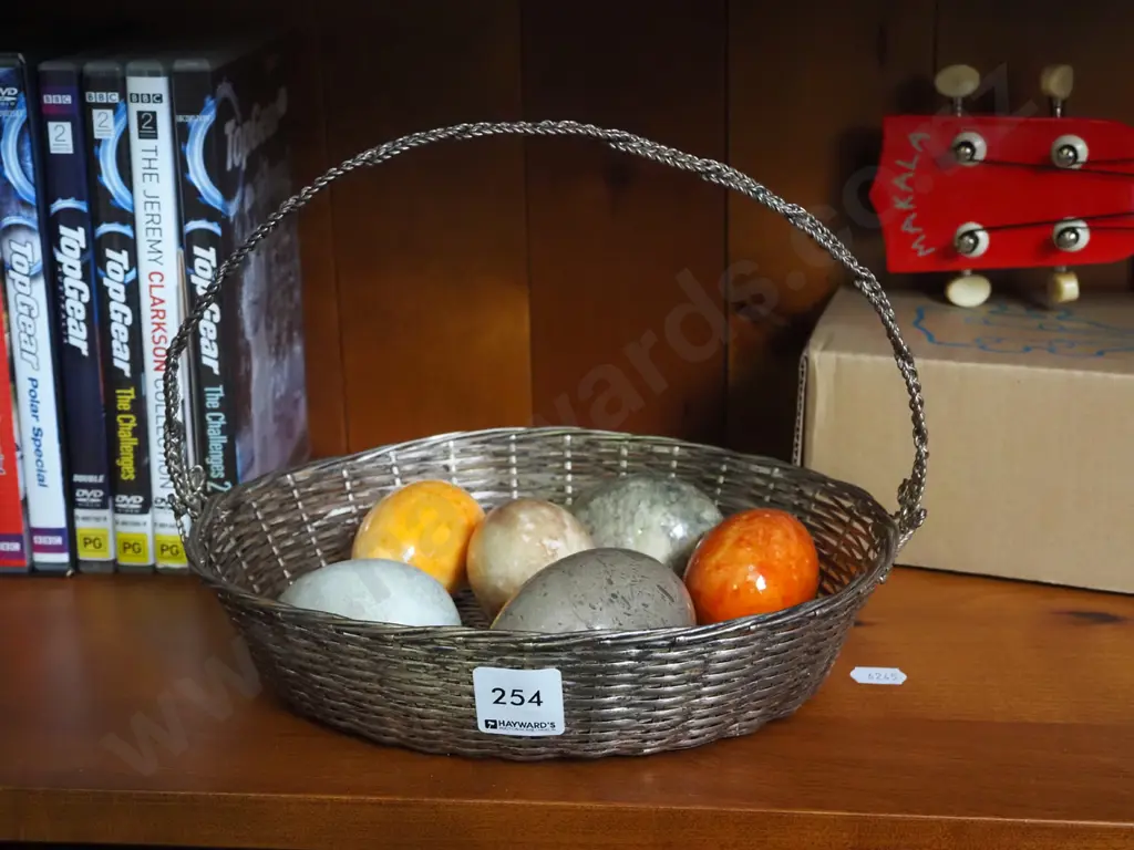 woven wire basket, ornamental stone eggs Image 1++