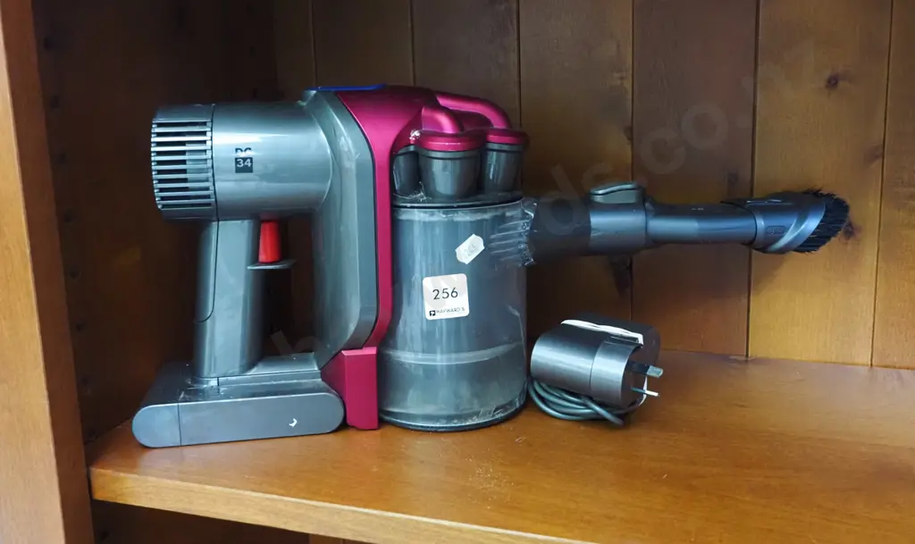 Dyson DC34 hand held battery powered vacuum cleaner Image 1++