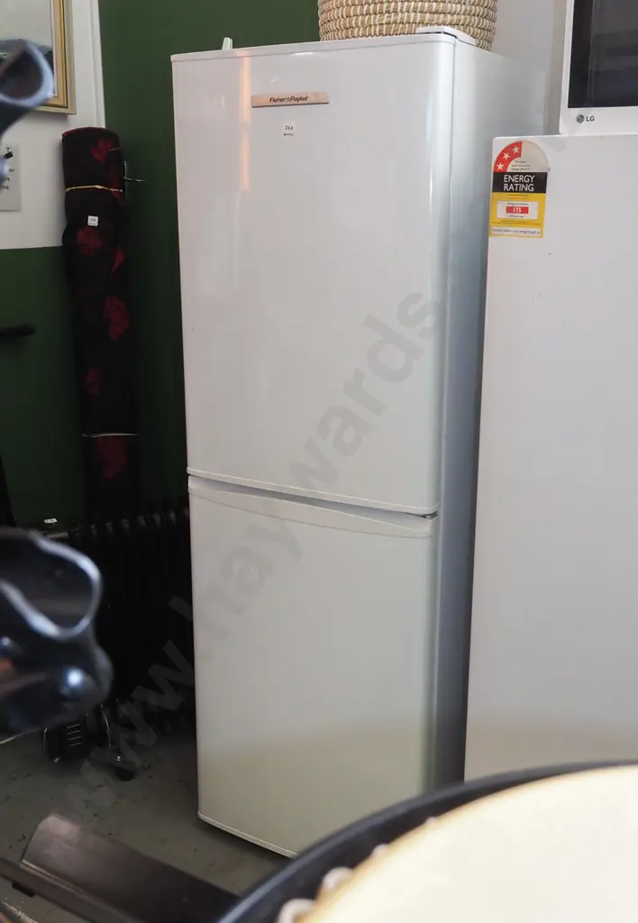 F&P fridge/freezer - missing foot stay at left back - some dints and marks to doors H-1600 W-530 D-560 Image 1++