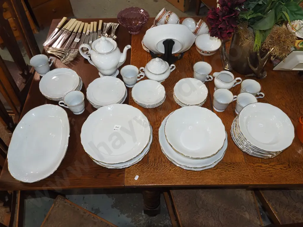 large assortment of white and gold rimmed dinner items Image 1++