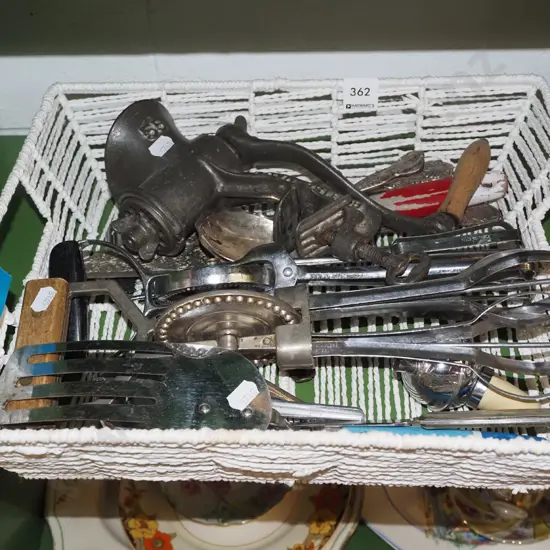 woven string basket and kitchen utensils