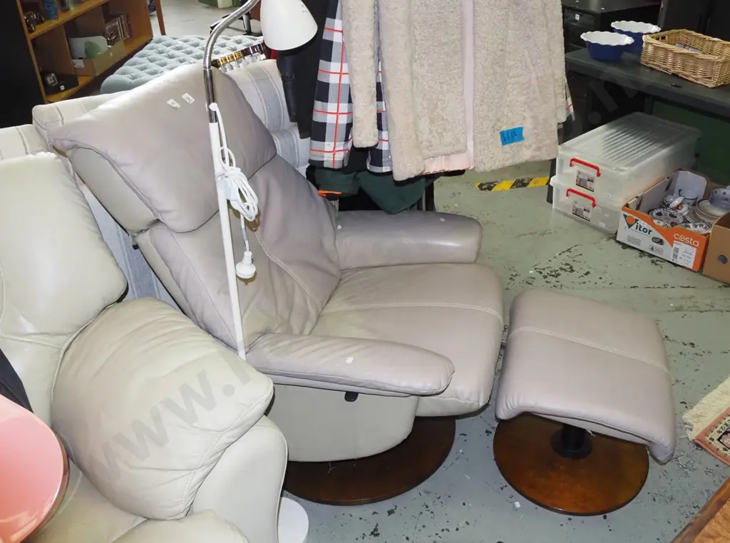 cream leather reclining swivel armchair with matching footstool Image 1++
