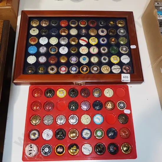 2x tray of various champagne bottle tops