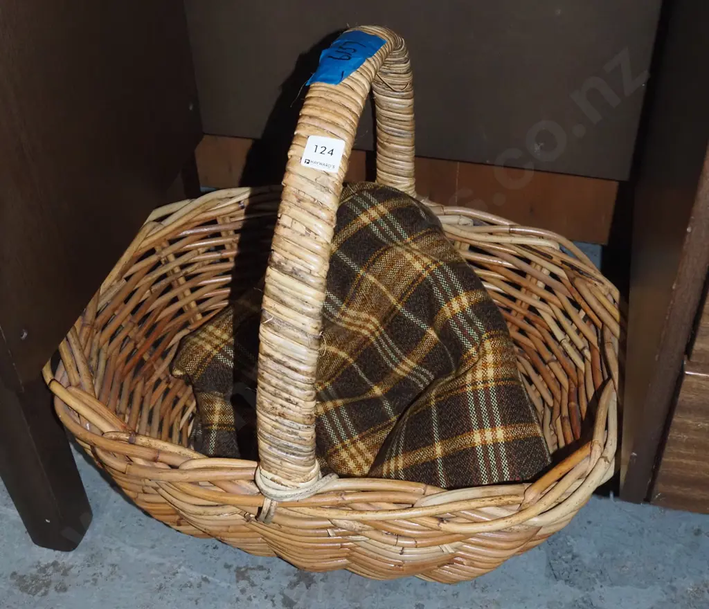 large cane basket, piece of woollen tartan fabric Image 1++