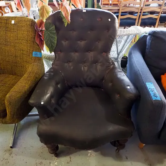 Victorian style vinyl deep buttoned fireside chair
