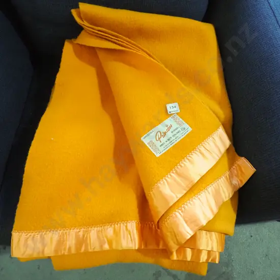 Onehunga Princess orange woollen blanket
