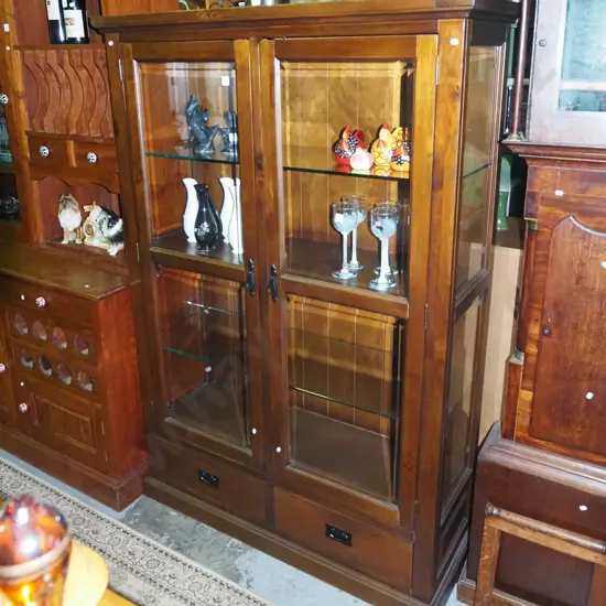 sold pine 2 door display cabinet, 2 lower drawers, 4 bevelled edge glass panes, 2x adjustable shelves