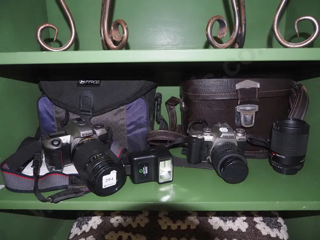 2x 35mm SLR cameras, camera bags, Pentax NZ/5N with additional lens, Nikon N65 Image 1++