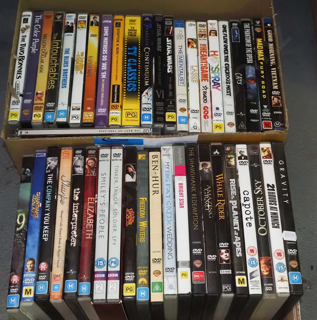2x boxes of DVDs - red dots Image 1++
