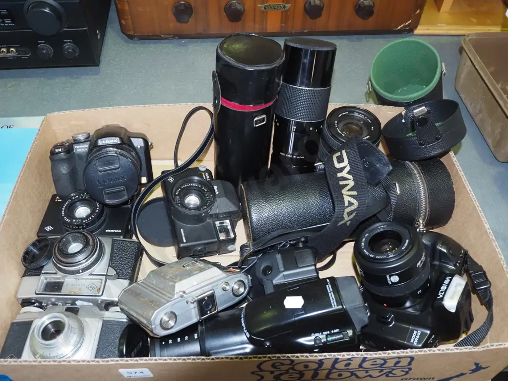 box; assorted 35mm cameras, additional lenses Image 1++