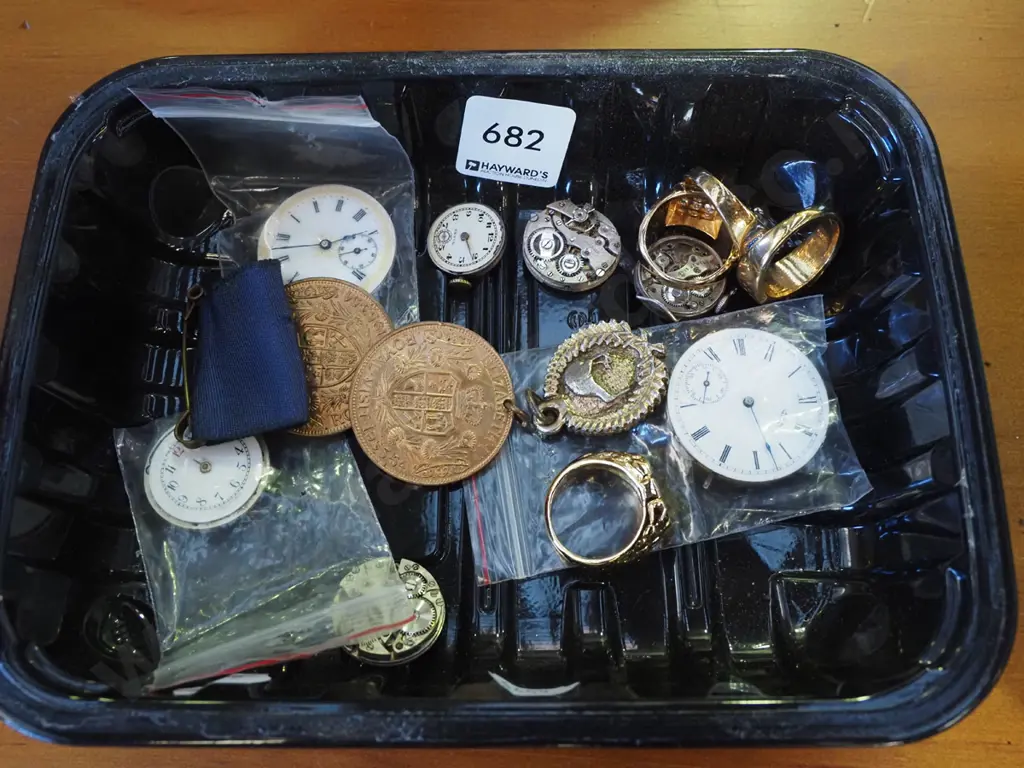 black tray; rings, medals, part watches Image 1++