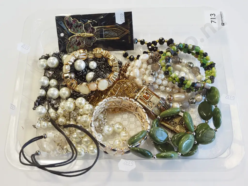 plastic tray of bangles and bracelets Image 1++
