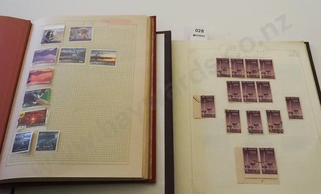 2x stamp albums Image 1++