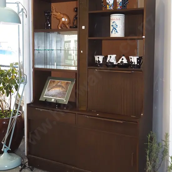 dark stained mid century wall unit with 2 sliding doors, liquor cabinet
