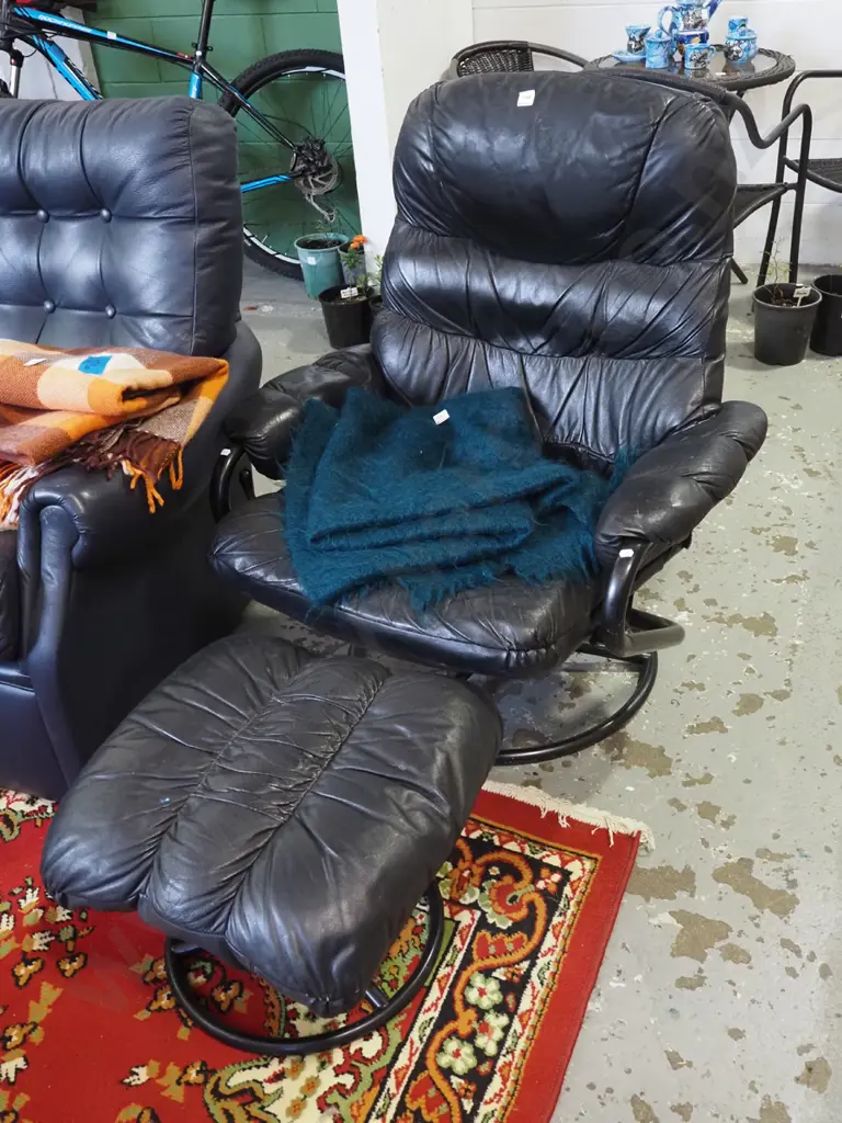 black vinyl swivel chair with footstool - rips and wear Image 1++