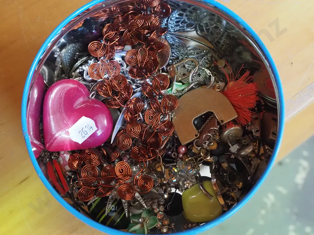tin of costume jewellery Image 1++