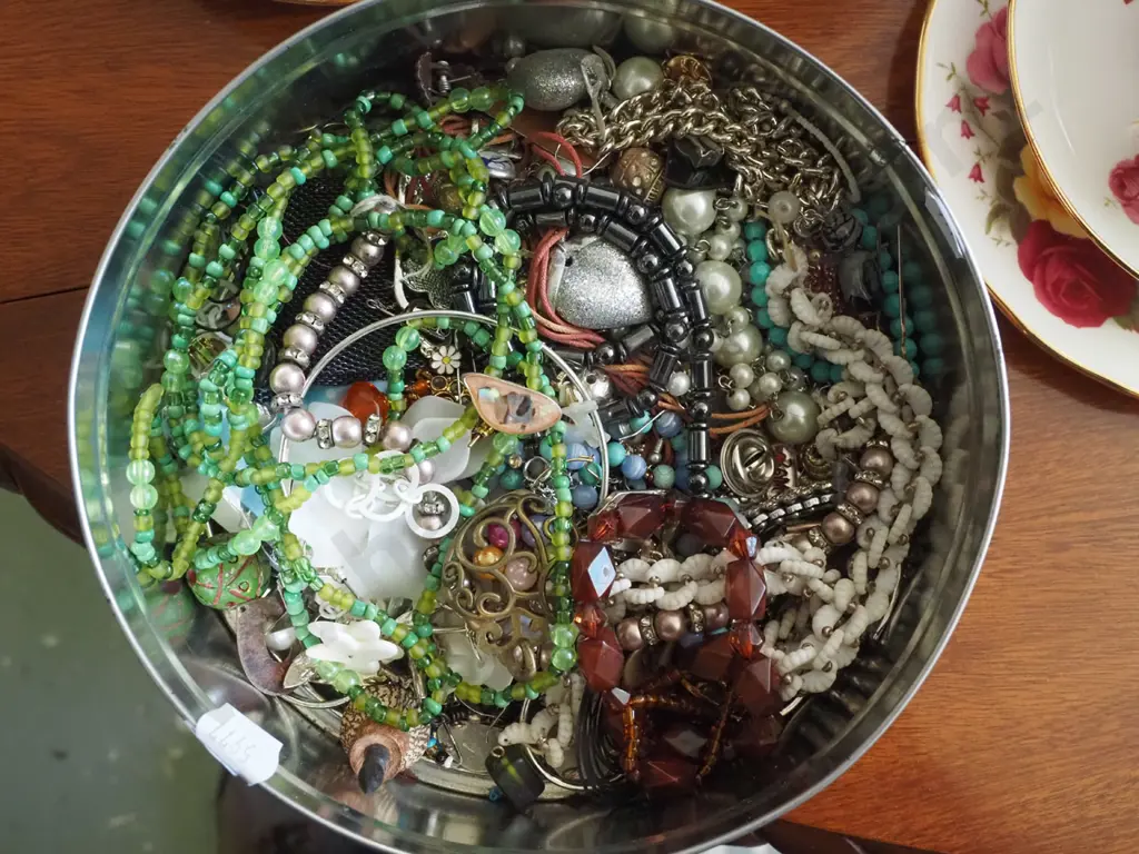 tin of costume jewellery Image 1++