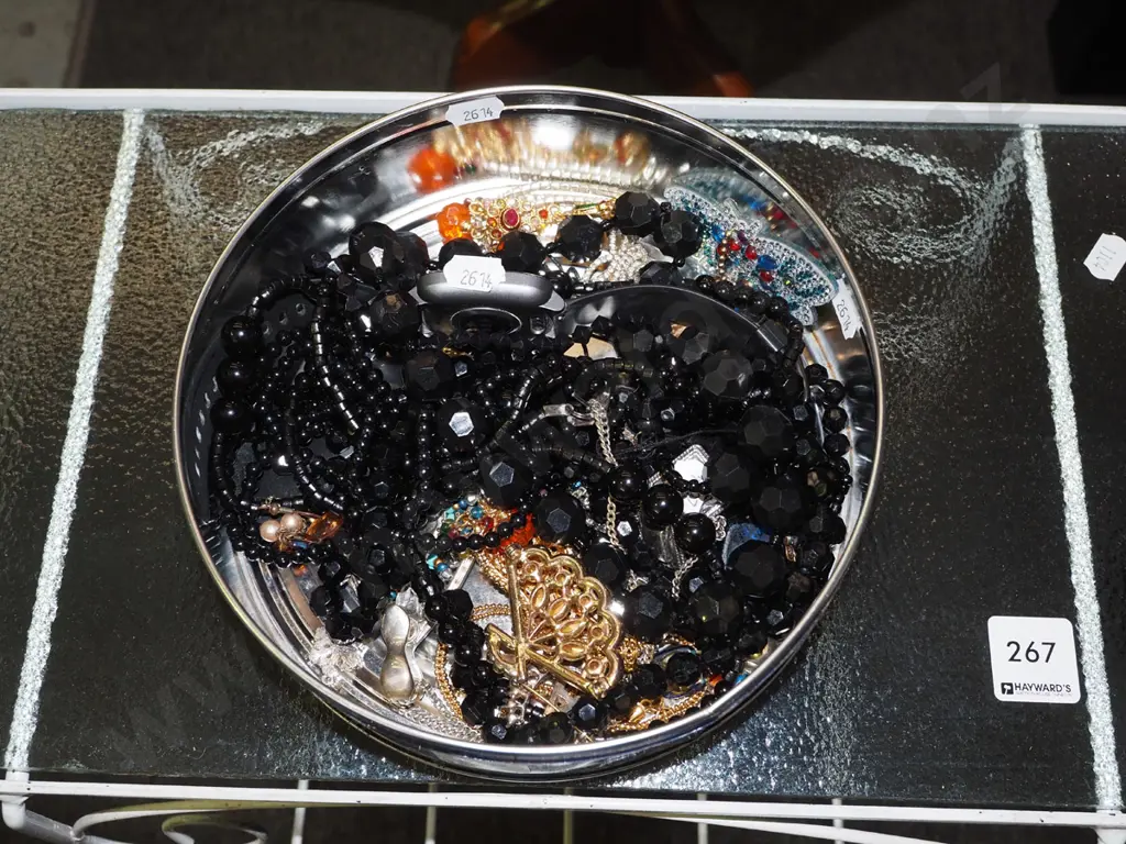 tin of costume jewellery Image 1++