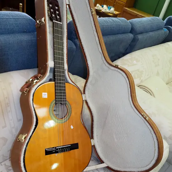 Misaki acoustic guitar and hard case