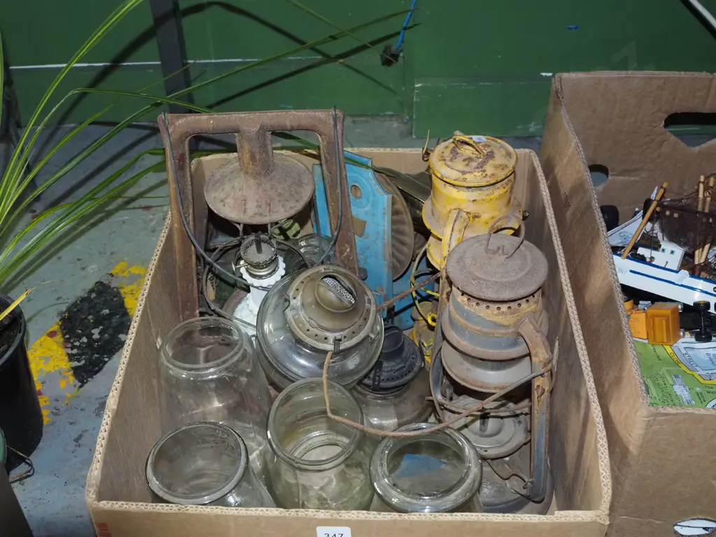 box of restorer's hurricane lanterns and lantern parts Image 1++