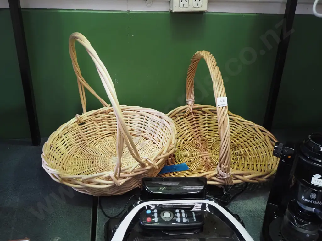2 cane baskets Image 1++