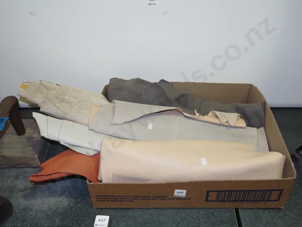 box of leather pieces Image 1++