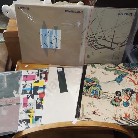 stack of LPs; Fleetwood Mac, Petshop Boys, Icehouse etc