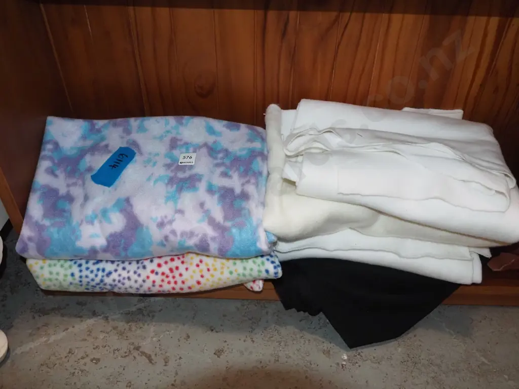 various pieces of polar fleece, black fabric Image 1++
