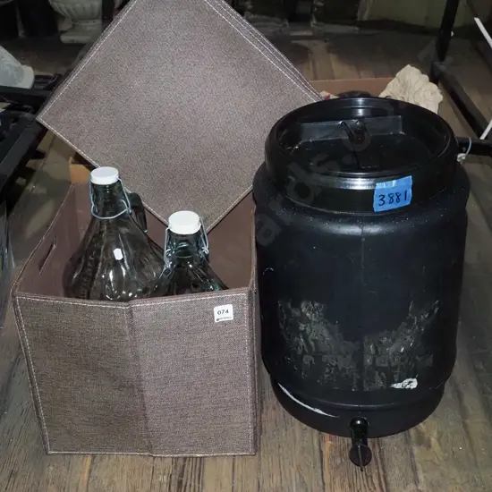 black lidded tapped plastic barrel, 2x demi johns, lidded storage crate