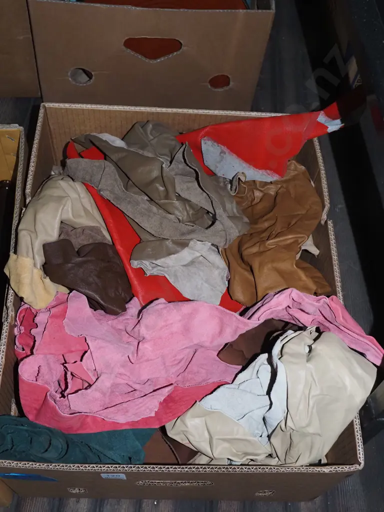box of leather scraps Image 1++