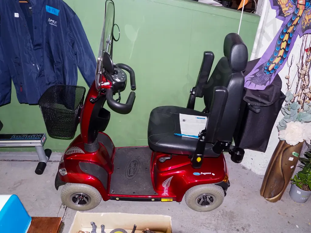 Invacare mobility scooter with shopping baskets and charger - batteries replaced 2022 Image 1++