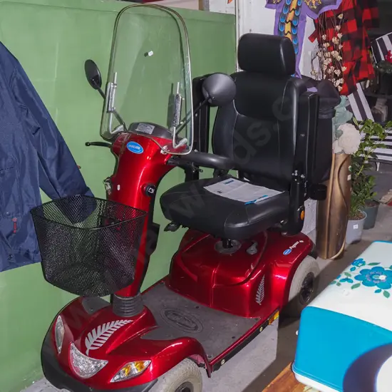 Invacare mobility scooter with shopping baskets and charger - batteries replaced 2022