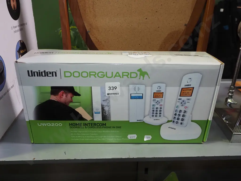box; Uniden door bell, cordless phone in one Image 1++