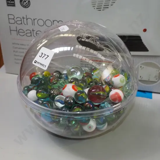 plastic orb of marbles