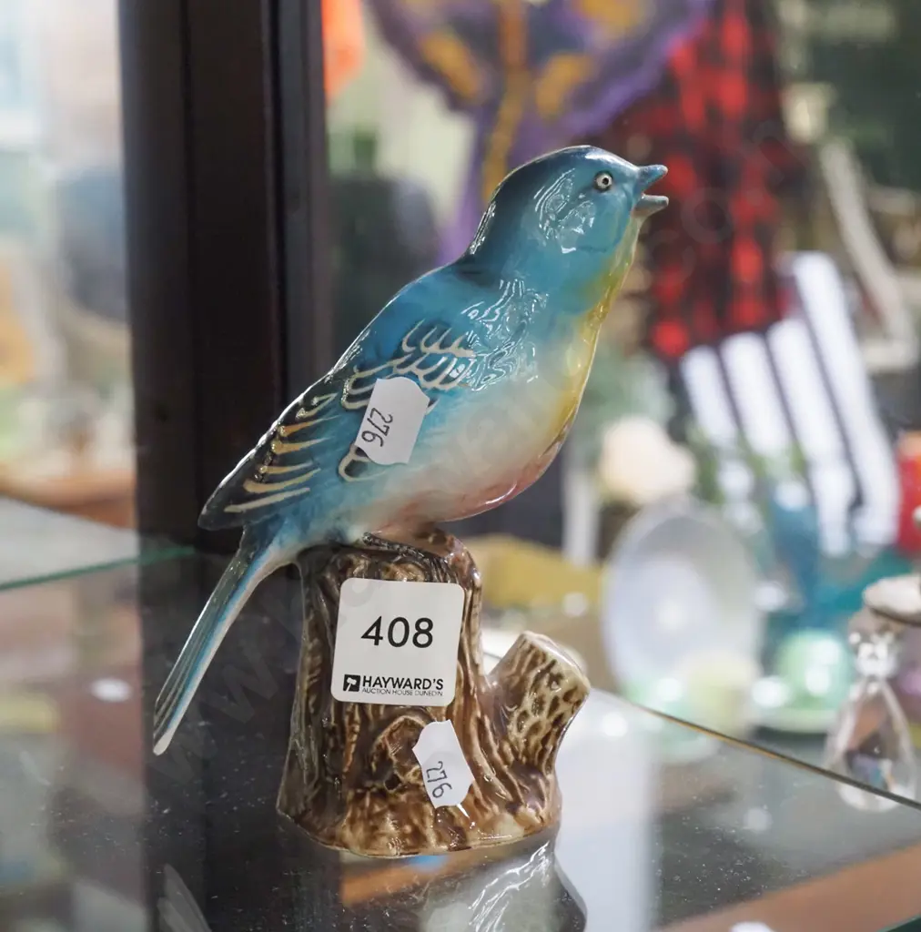 small bird figurine H-150 Image 1++