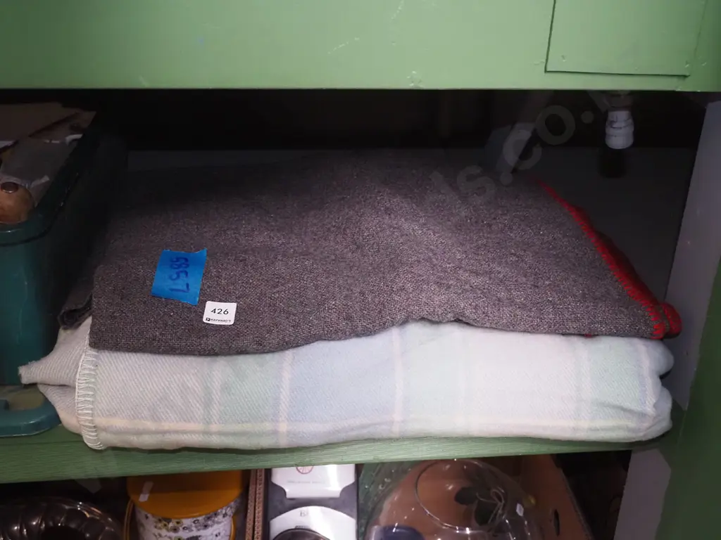 grey woollen and checked blankets Image 1++