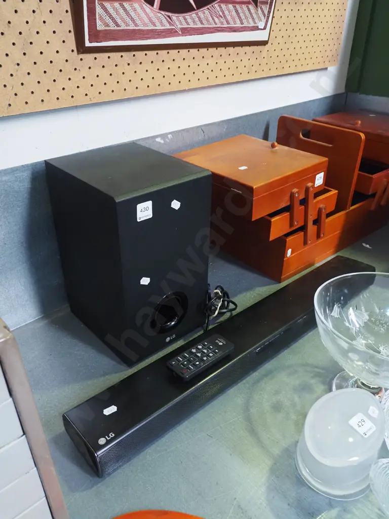 LG sound bar with remote and speaker Image 1++