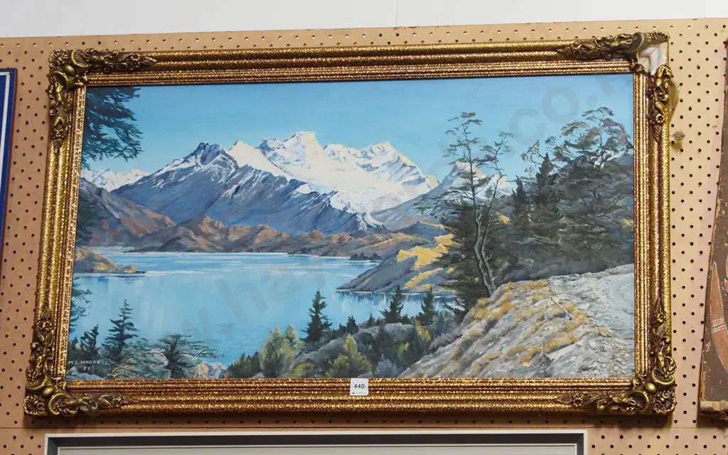  M Horrell '77 framed oil - lake and mountain scnee - damage to frame Image 1++