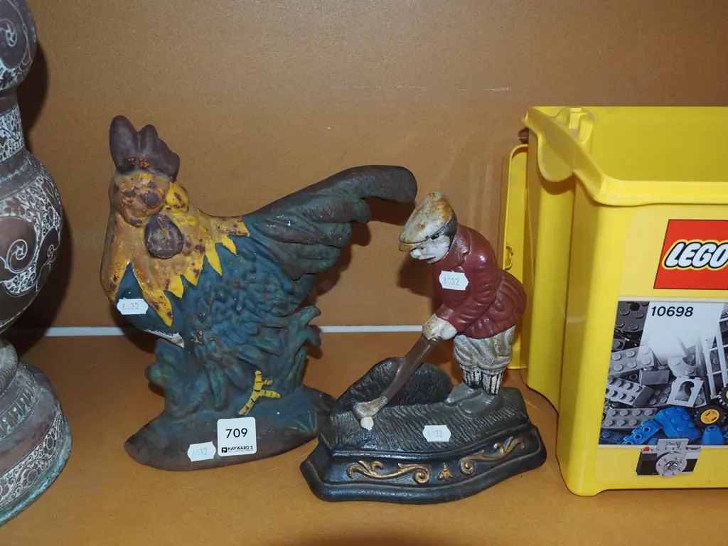 cast iron chicken and golfer doorstops Image 1++