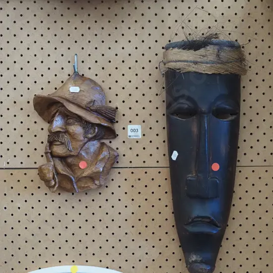 carved wooden wall silhouette, ethnic mask