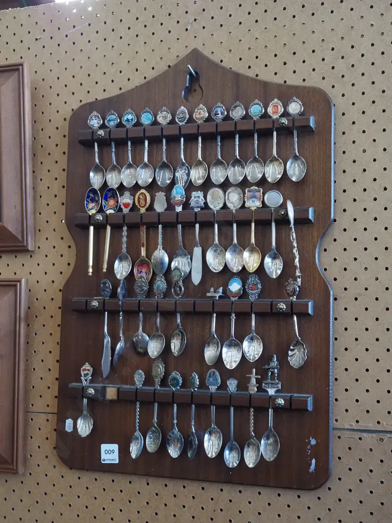 souvenir teaspoons on stand Image 1++