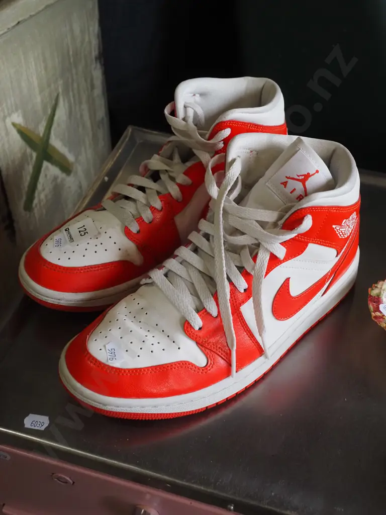 pair of size US 9 red and white Nike Air Jordans Image 1++