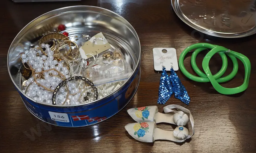 tin of costume jewellery Image 1++