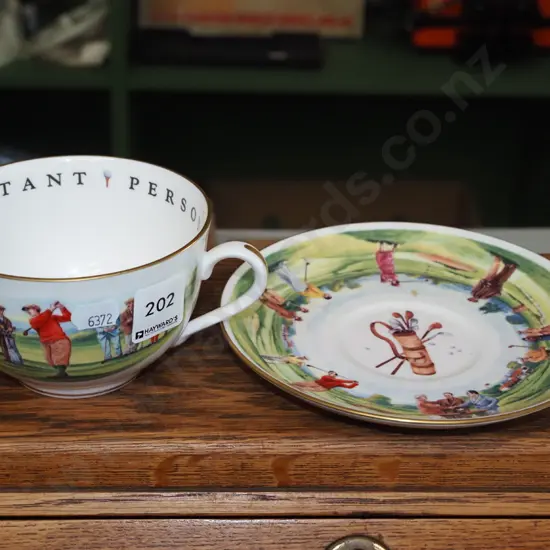 Royal Worcester golfing mug and saucer